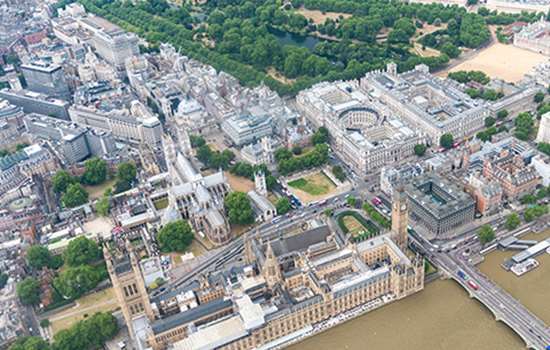 Aerial view of London including the Houses of Parliament, Buckingham Palace and Westminster Abbey